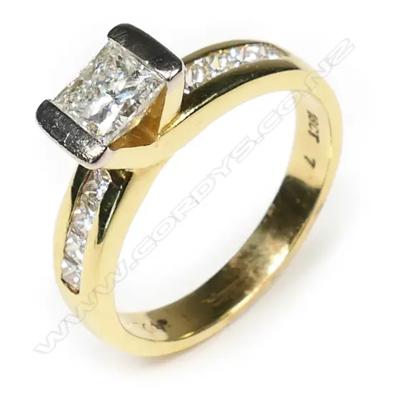 An 18ct gold and diamond solitaire ring,