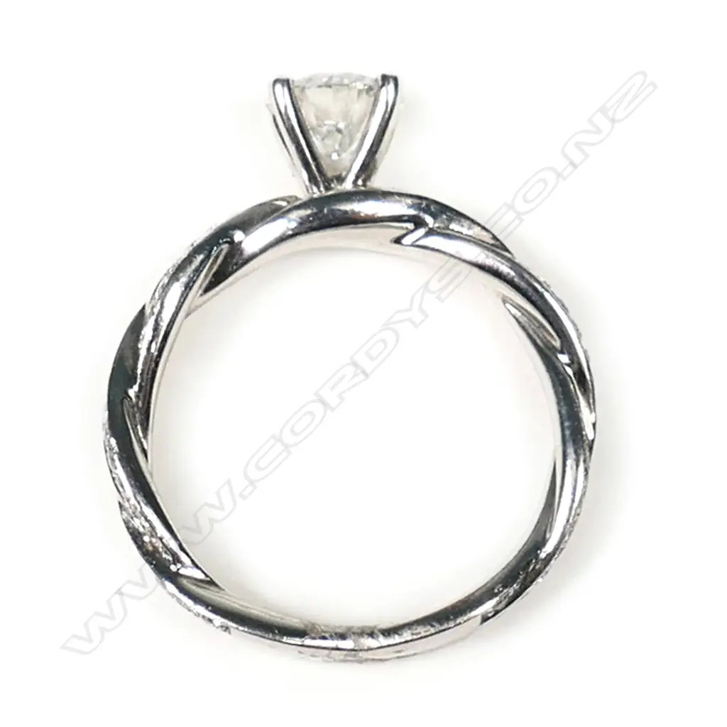 A 14ct white gold solitaire diamond ring, Image 1++