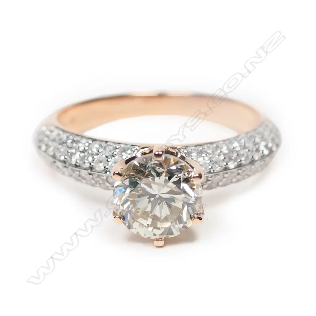 A 14ct rose gold and diamond ring, Image 1++