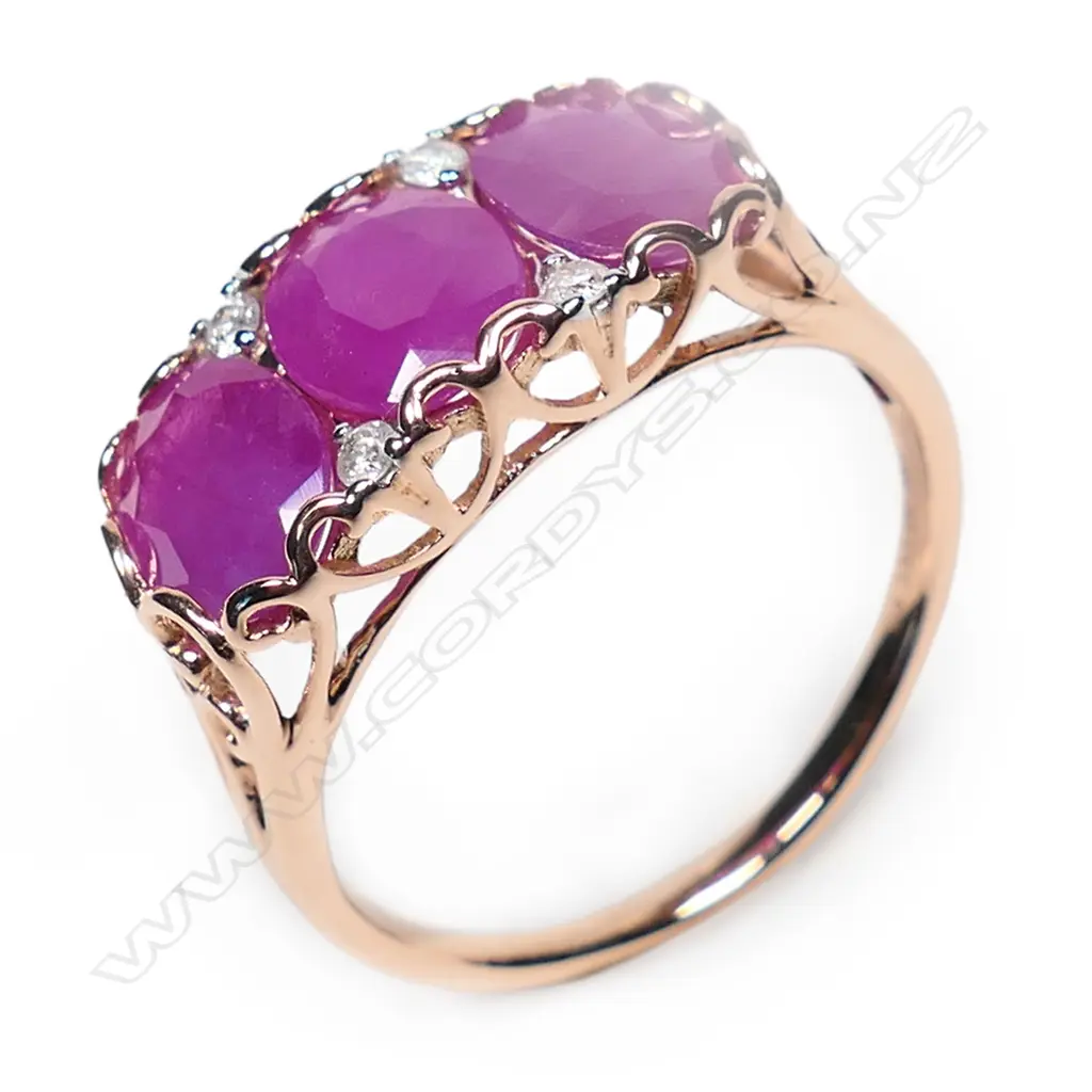 A 14ct rose gold, ruby and diamond ring, Image 1++