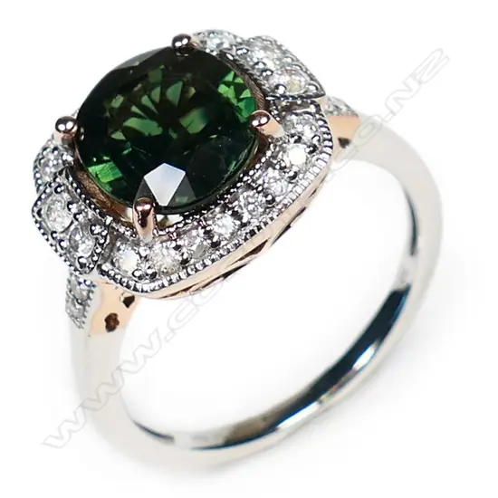 A 14ct rose and white gold, green sapphire and diamond antique style ring,