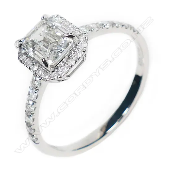 A 14ct white gold and diamond halo ring,