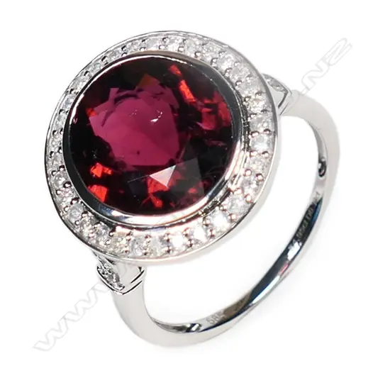 A 14ct white gold, tourmaline and diamond cocktail ring,