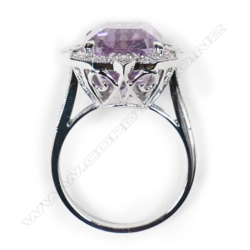 A 14ct white gold, kunzite and diamond halo ring, Image 1++