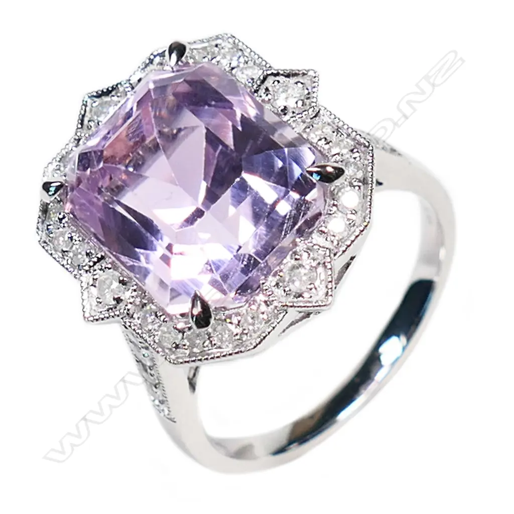 A 14ct white gold, kunzite and diamond halo ring, Image 1++
