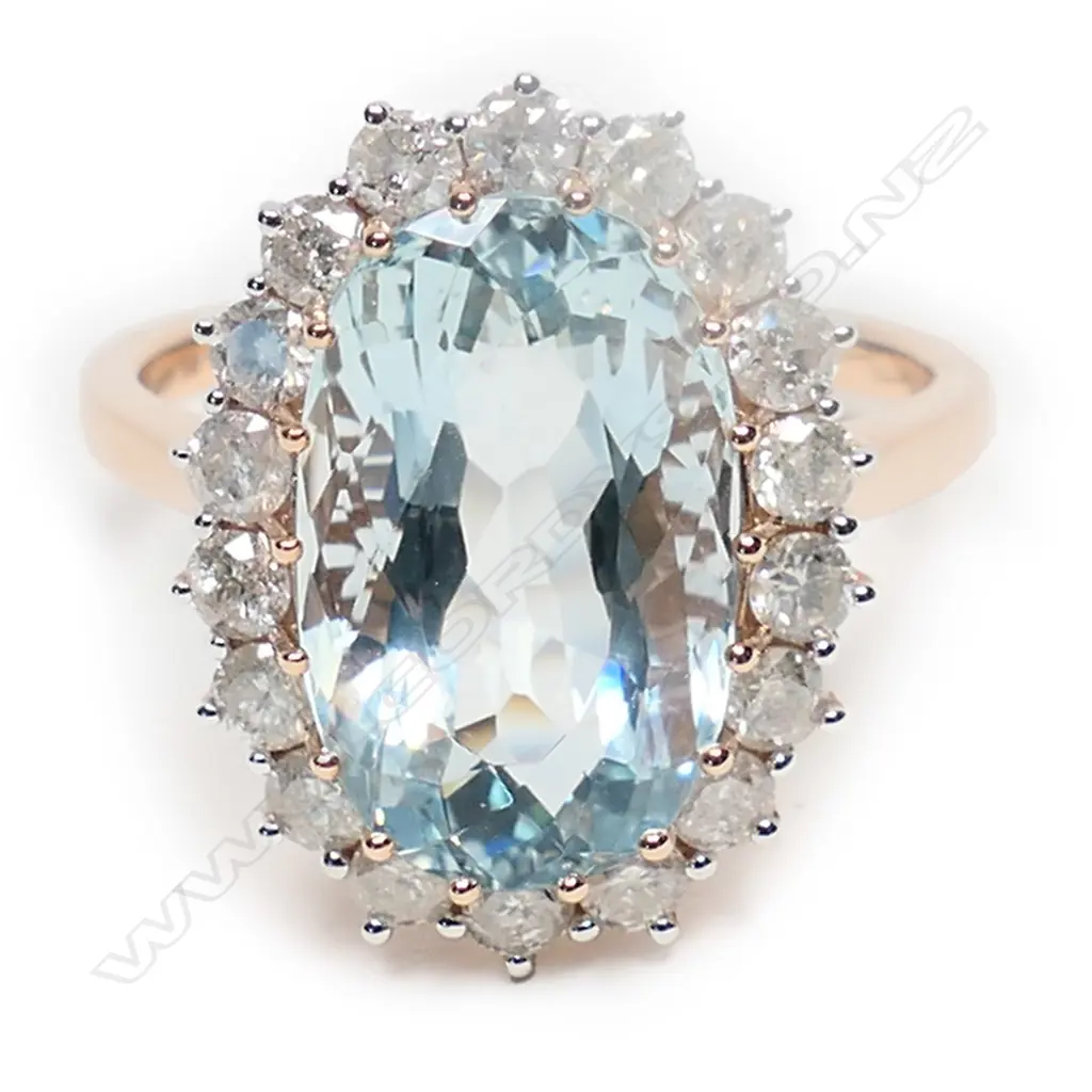 A 14ct rose gold, aquamarine and diamond vintage style halo ring, Image 1++