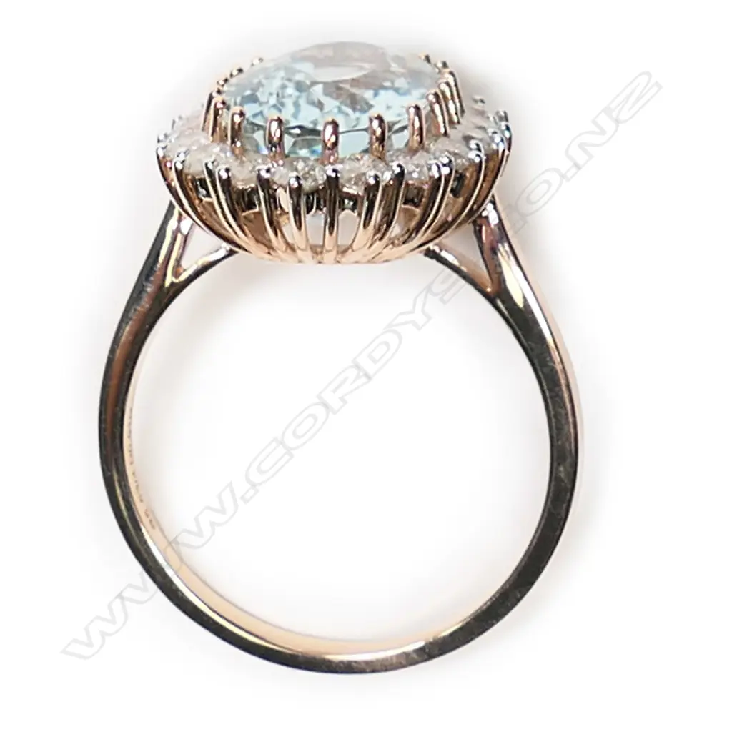 A 14ct rose gold, aquamarine and diamond vintage style halo ring, Image 1++