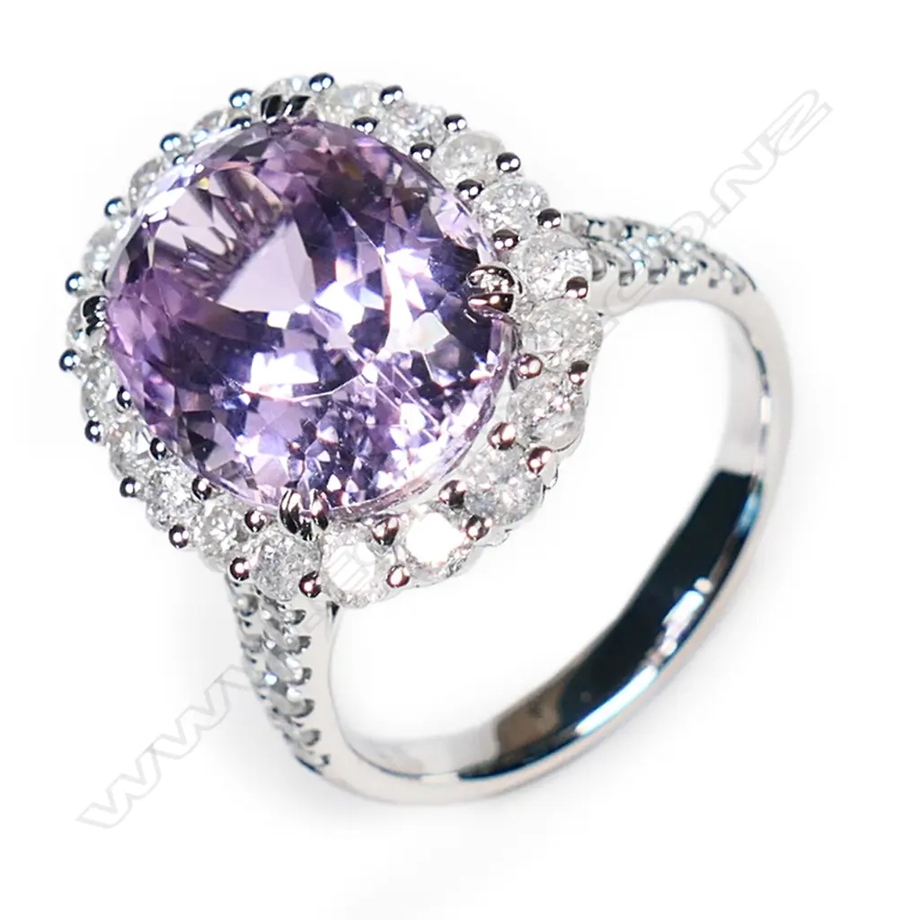 A 14ct white gold, kunzite and diamond halo ring, Image 1++