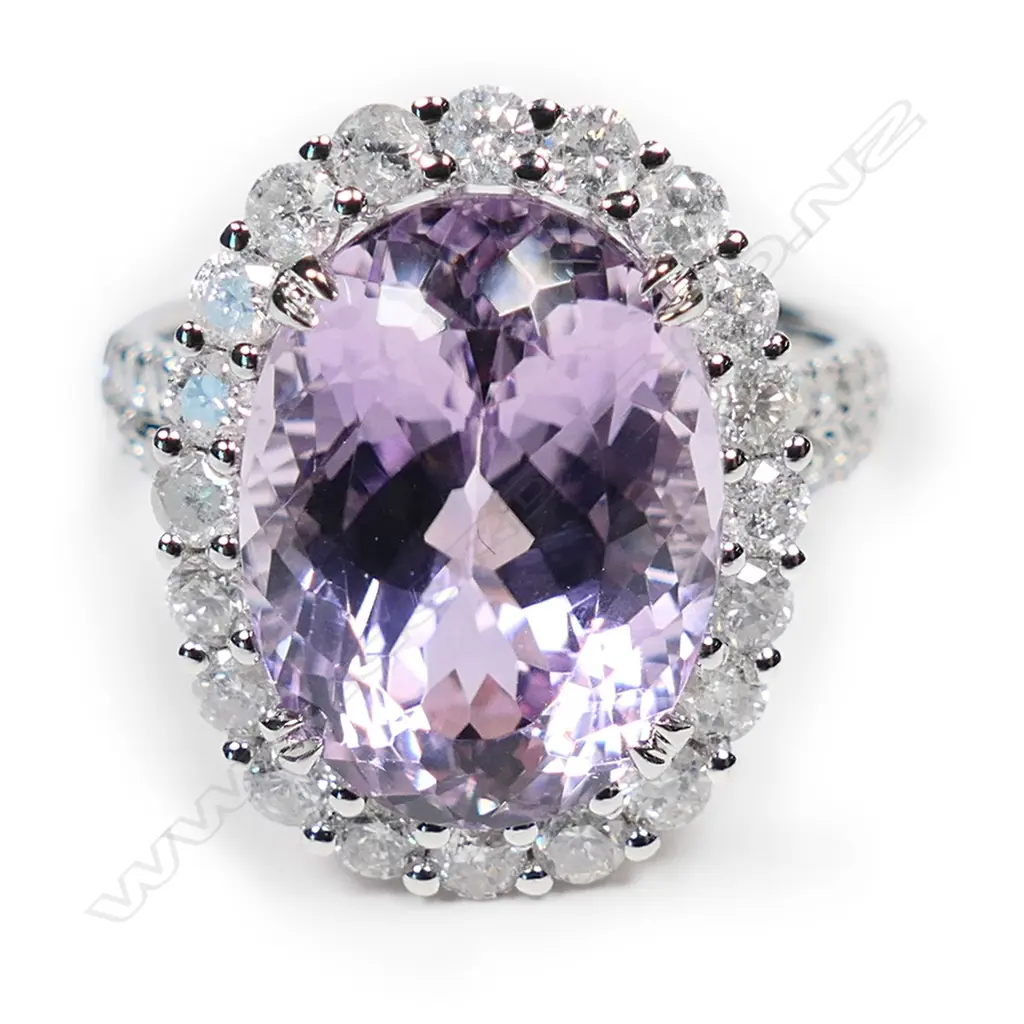 A 14ct white gold, kunzite and diamond halo ring, Image 1++
