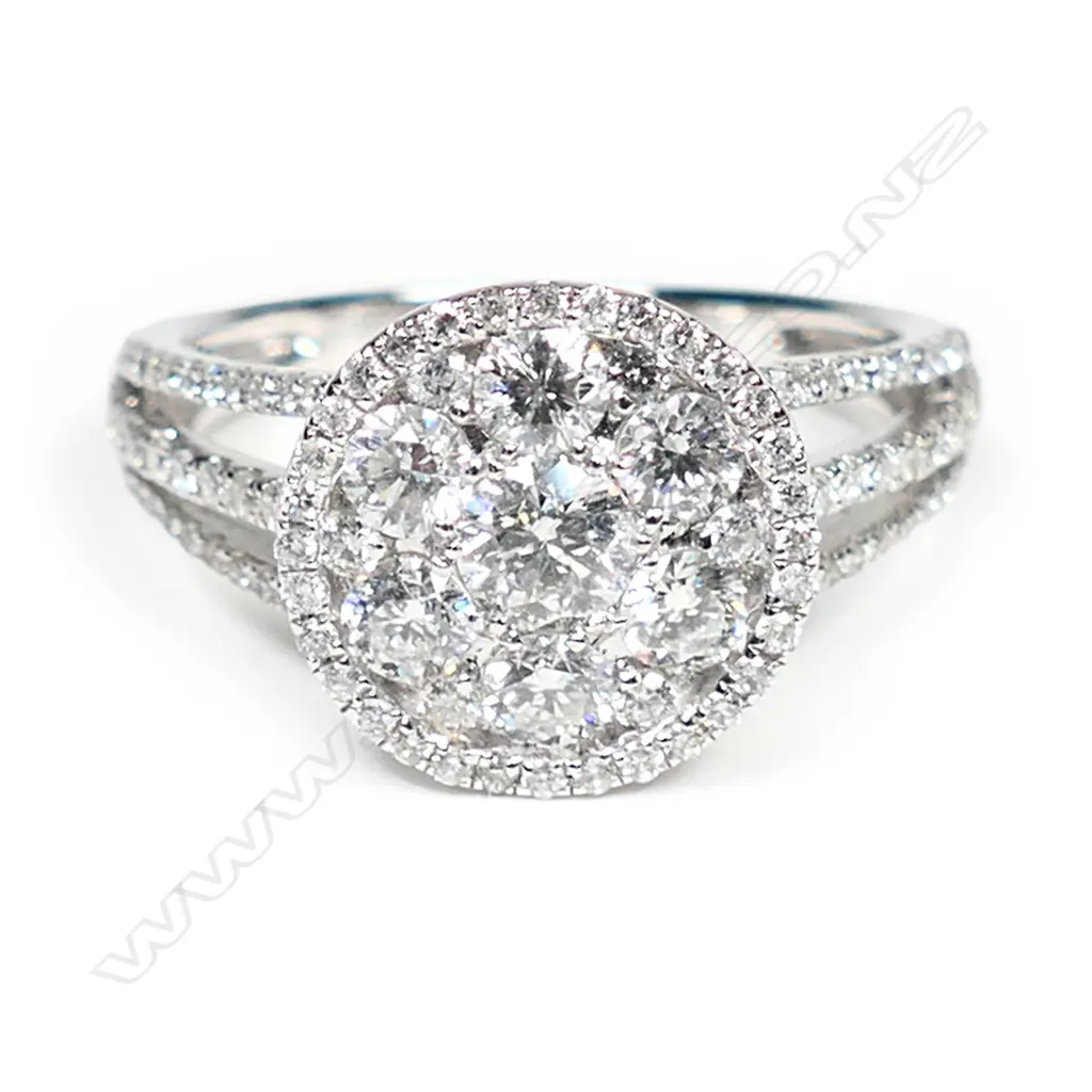 An 18ct white gold and diamond dress ring, Image 1++