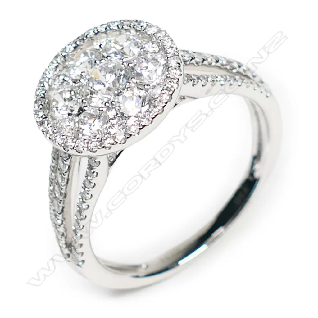 An 18ct white gold and diamond dress ring, Image 1++
