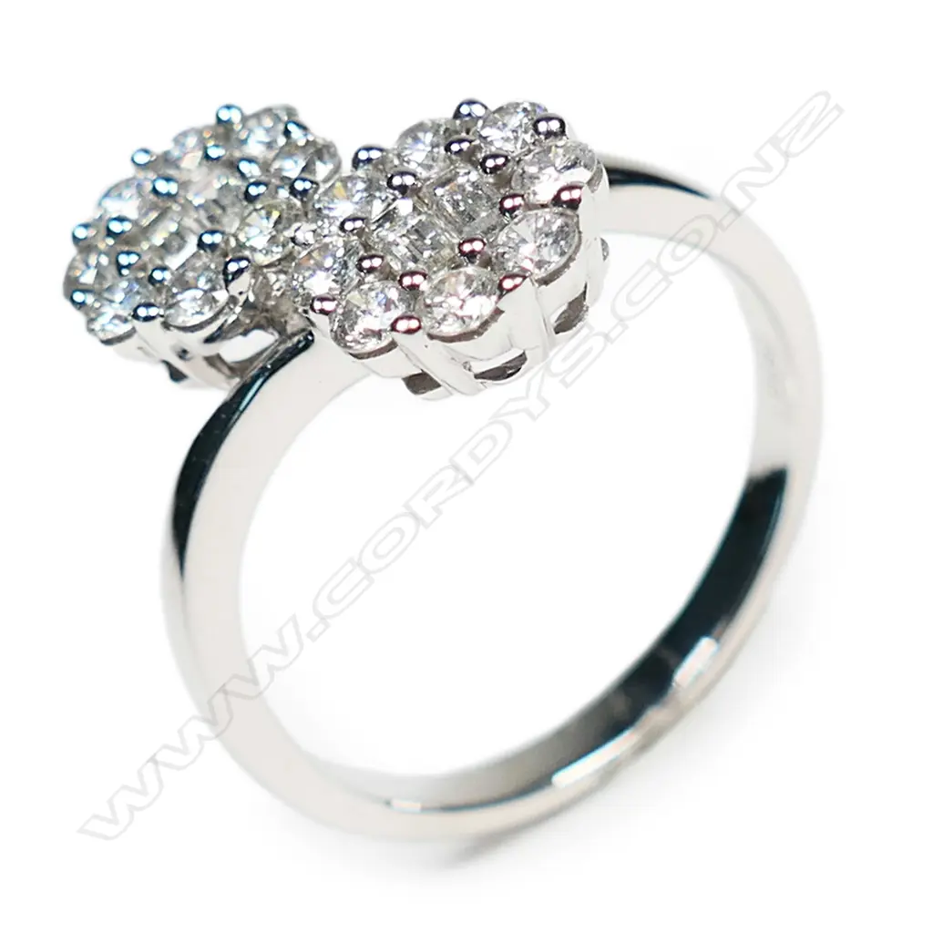 An 18ct white gold and diamond double cluster ring, Image 1++