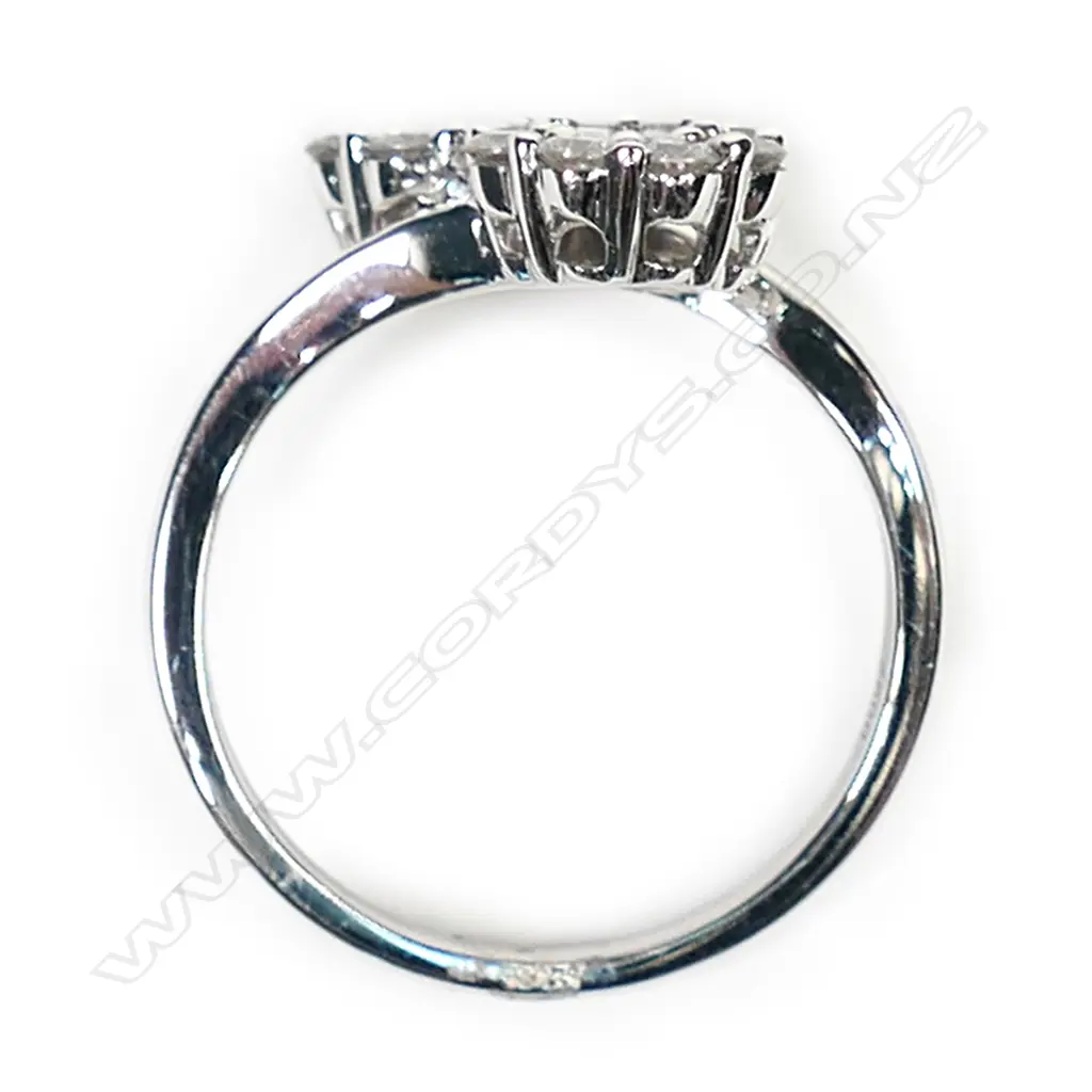 An 18ct white gold and diamond double cluster ring, Image 1++
