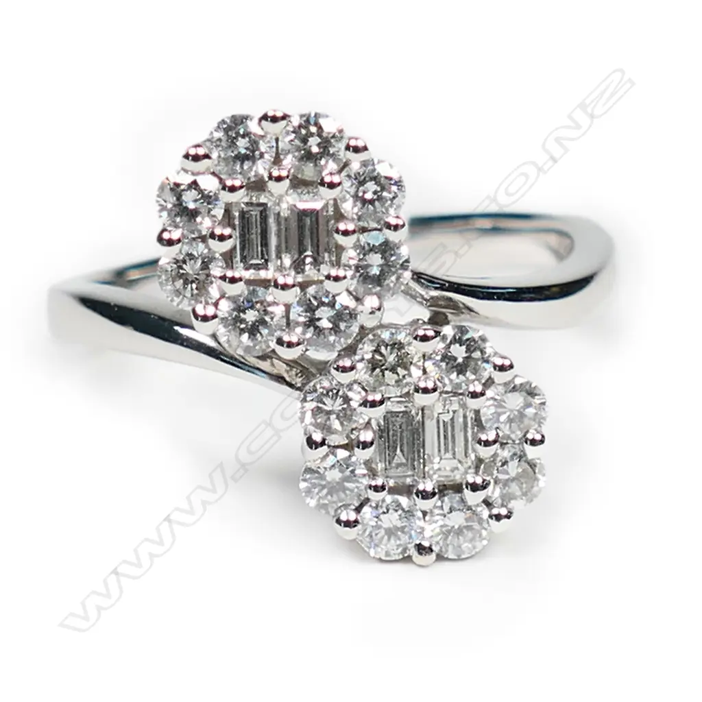 An 18ct white gold and diamond double cluster ring, Image 1++