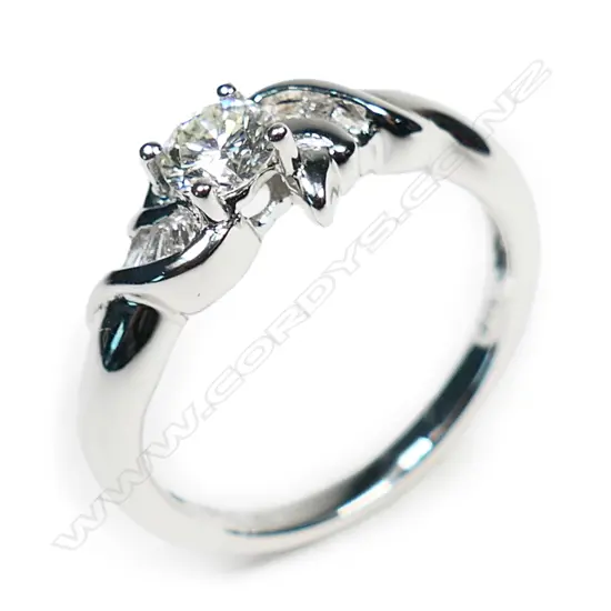 An 18ct white gold and diamond ring,