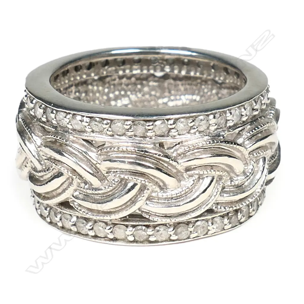 A 14ct white gold and diamond dress ring, Image 1++