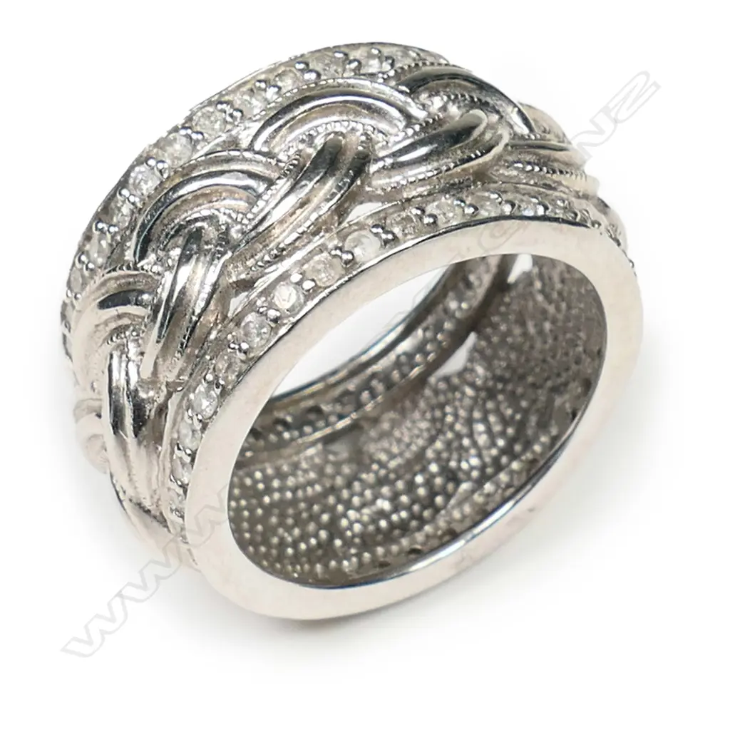 A 14ct white gold and diamond dress ring, Image 1++