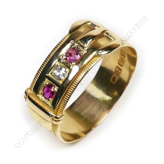 A vintage 18ct yellow gold, ruby & diamond buckle ring,
