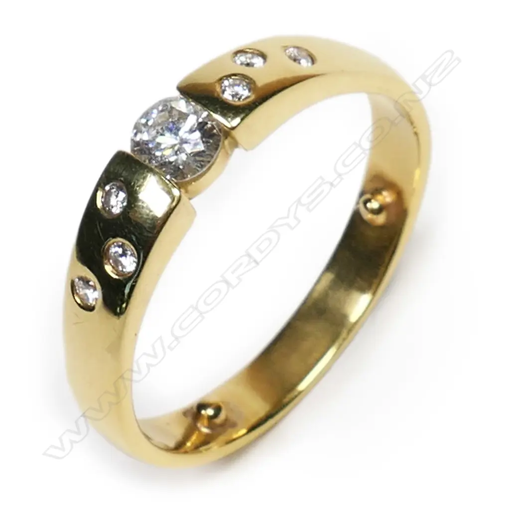#An 18ct yellow gold and diamond ring Image 1++