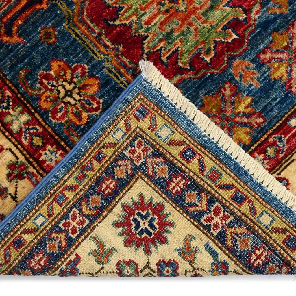 An Afghan Kazak hand knotted wool pile rug, Image 1++