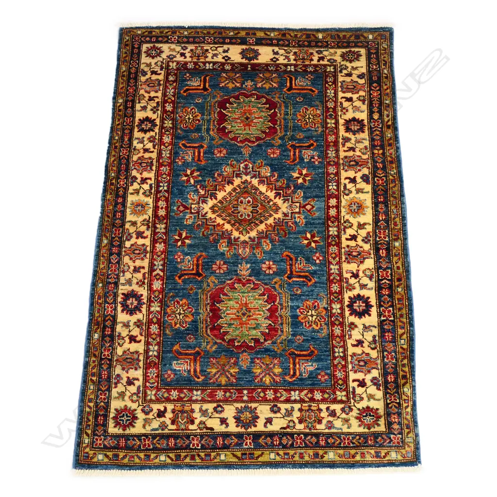 An Afghan Kazak hand knotted wool pile rug, Image 1++