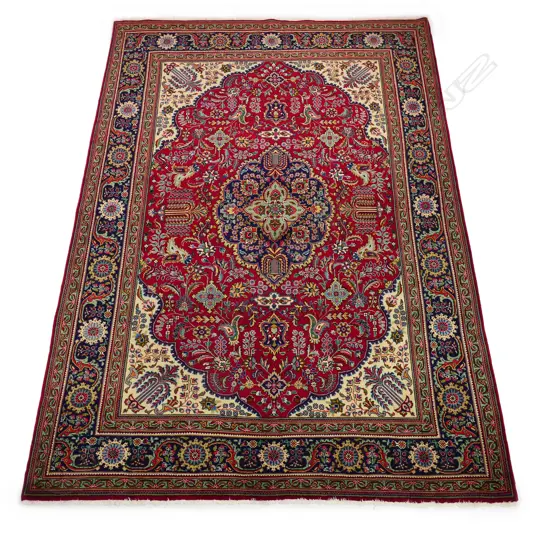 An Iranian hand knotted Tabriz carpet,