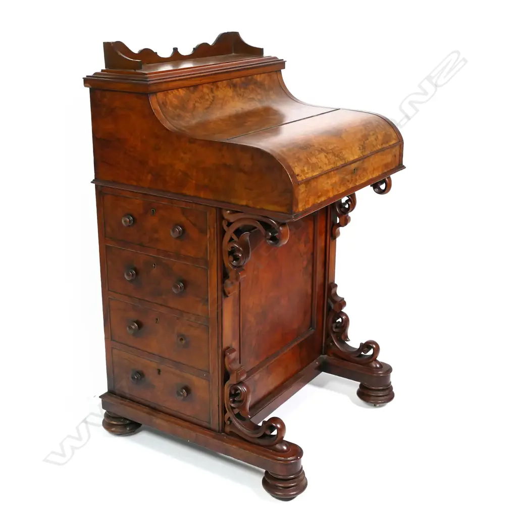 A Victorian burr walnut Davenport desk, with rise and fall compartment Image 1++