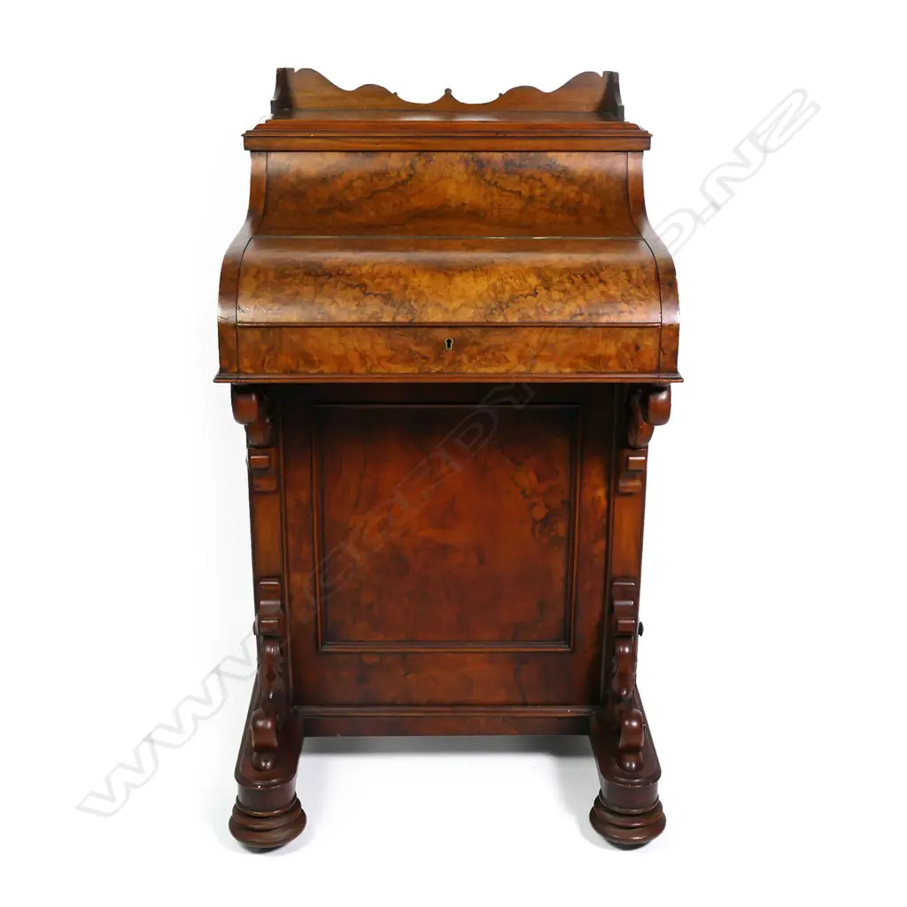 A Victorian burr walnut Davenport desk, with rise and fall compartment Image 1++