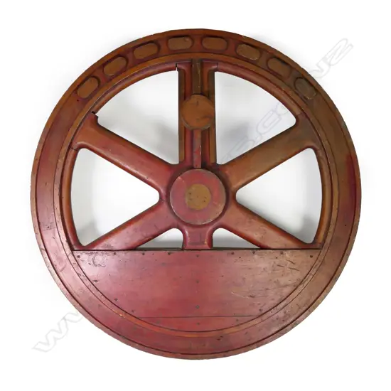 A large 19thC wooden foundry mould for a fly wheel,