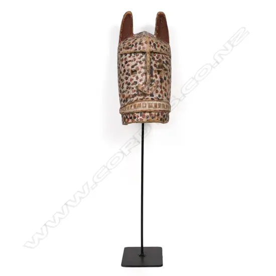 An African, carved and painted Dan tribe hyena mask,