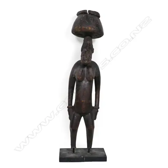 West African Yoruba carved wood figure of a woman,