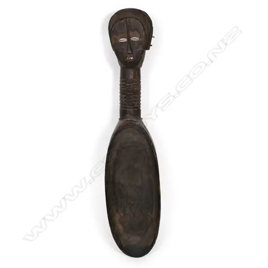 An African wood oval dish with portrait bust forming a single handle,