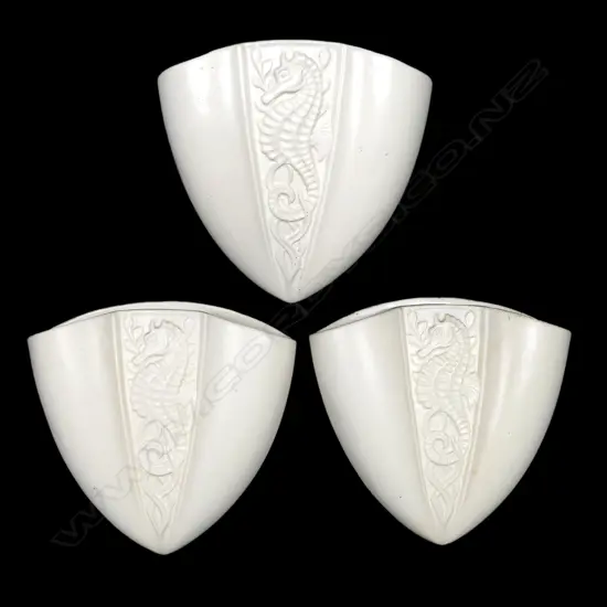 Three Crown Lynn wall pocket vases,
