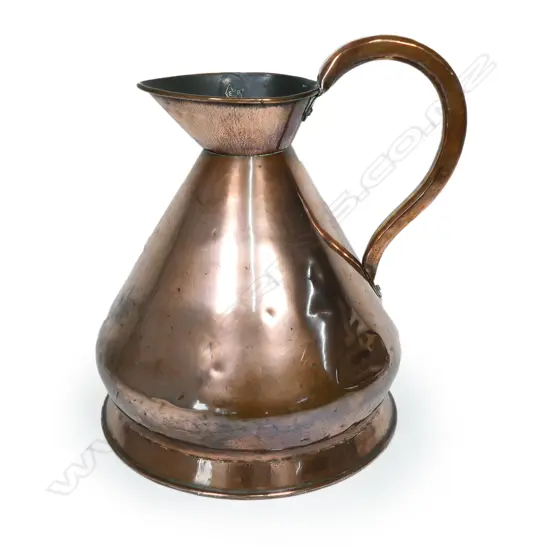 A vintage copper measure,
