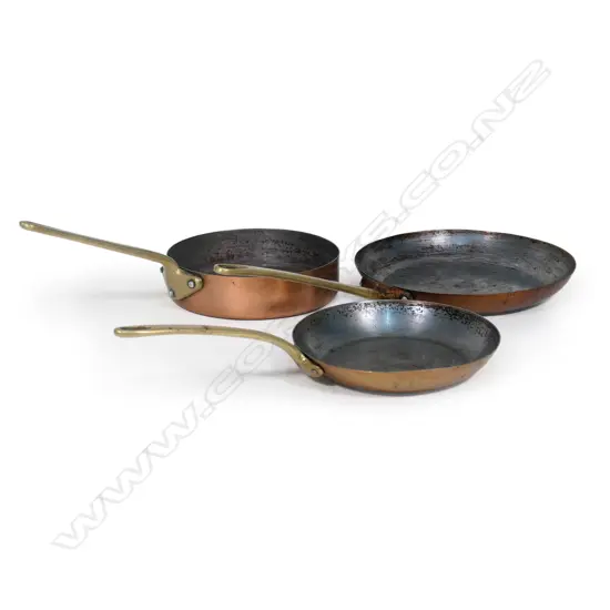 Three French St. Clair copper sauté pans,