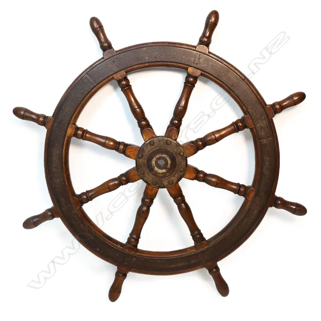 An antique ship's wheel (helm), in teak with iron strapped circumference and centre boss, Image 1++