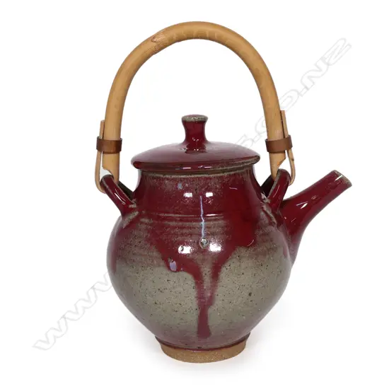A Peter Stichbury papa red glaze teapot,