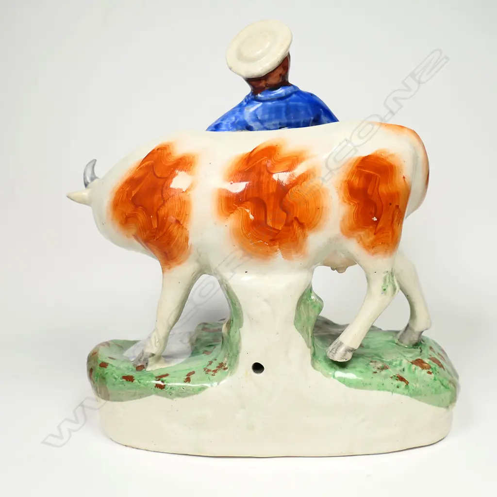 A pair of uncommon Victorian Staffordshire country figures, Image 1++