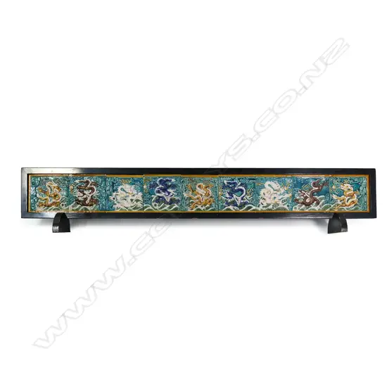 A set of nine Chinese porcelain tiles depicting Qing dragons,
