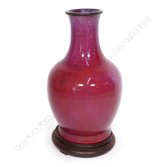 A Chinese reputed Qing dynasty glazed red vase,