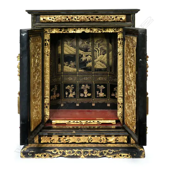 A Japanese Meiji black lacquer and gilt Buddhist house shrine cabinet