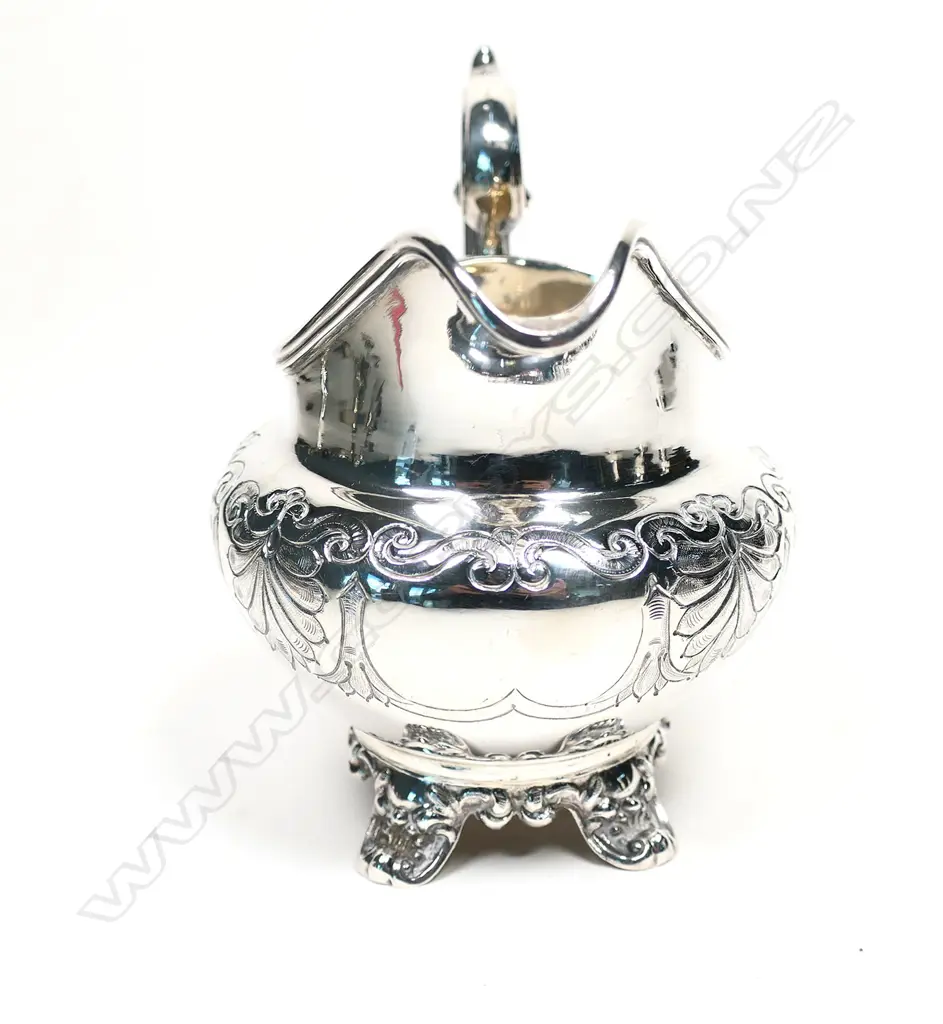 A Victorian silver cream jug, Exeter 1860 by Josiah Williams & Co., Image 1++