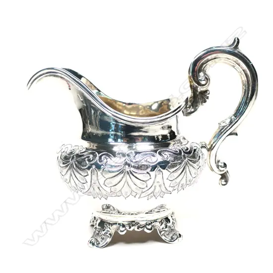 A Victorian silver cream jug, Exeter 1860 by Josiah Williams & Co.,