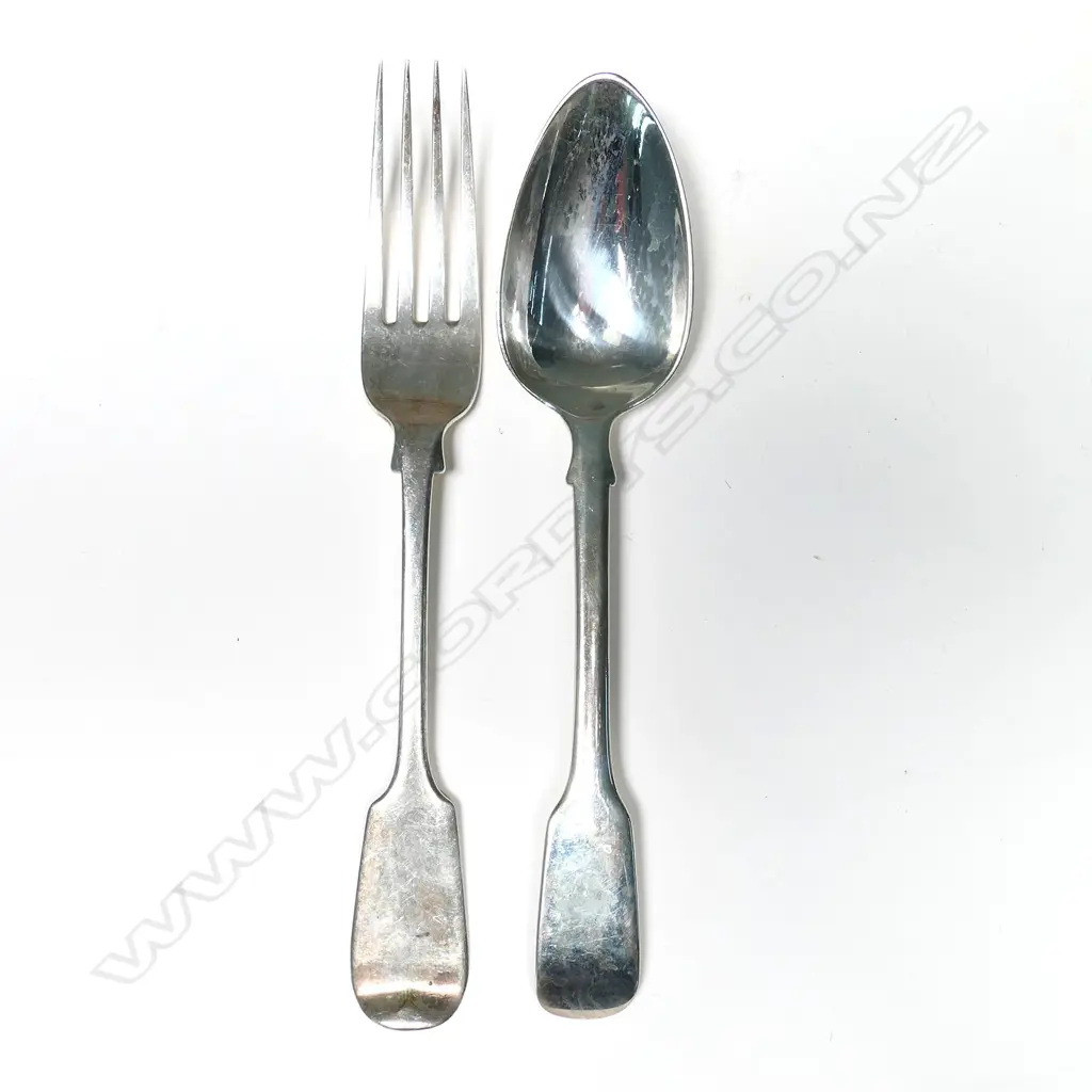 A 24 piece, twelve place setting of silver dessert forks and spoons. Forks Newcastle 1842/3, spoons London 1807. Total 1025gm Image 1++