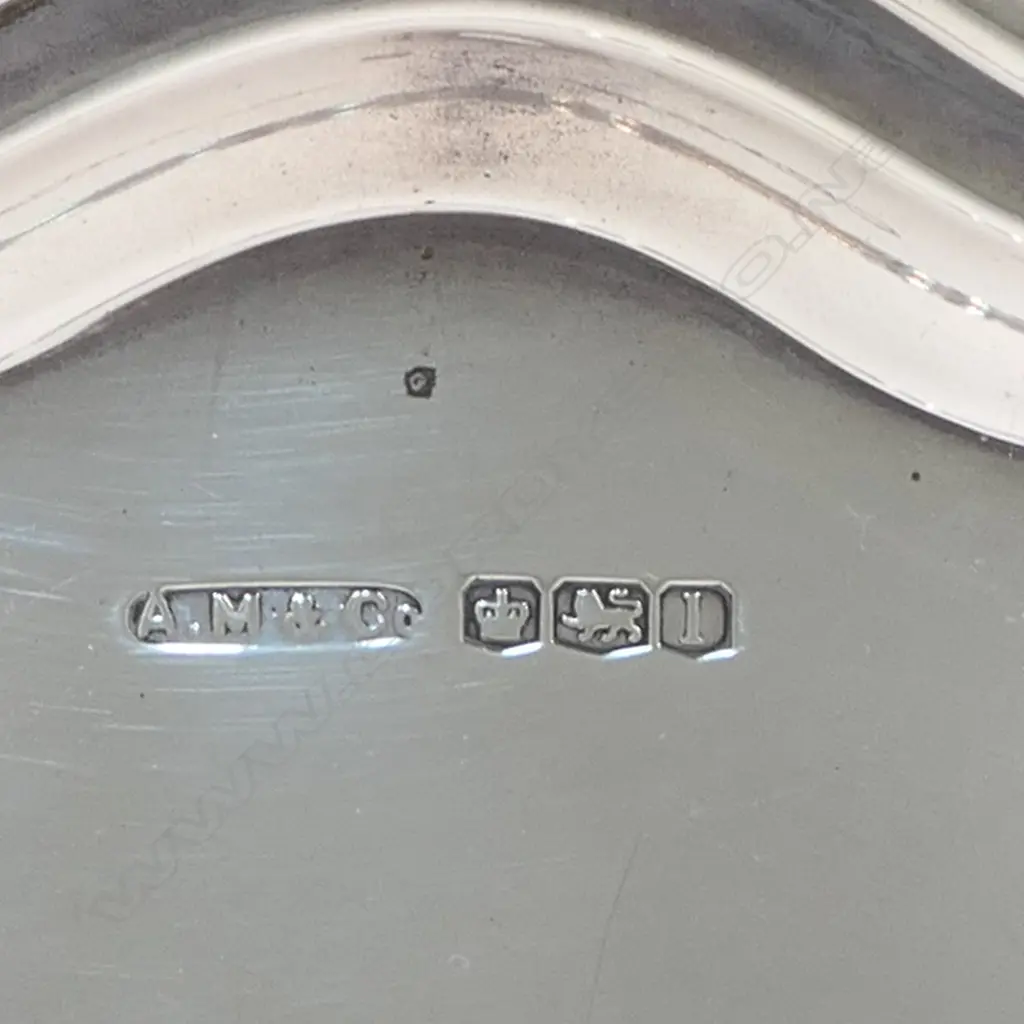 An early 20thC silver salver, Sheffield 1928. Image 1++