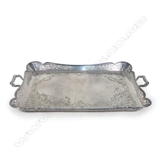 A substantial early 1900s two handled silver plate tray,
