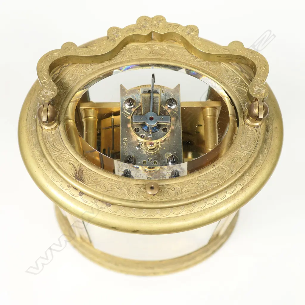 A fine, large 19thC brass oval cased carriage clock with strike and repeat mechanism, signed 'Just' and numbered '71189' to the silvered lever escapement platform, Image 1++