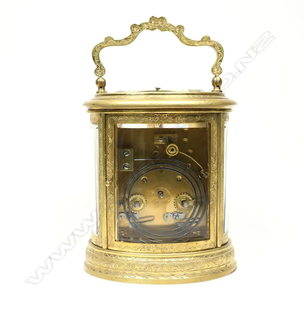 A fine, large 19thC brass oval cased carriage clock with strike and repeat mechanism, signed 'Just' and numbered '71189' to the silvered lever escapement platform, Image 1++