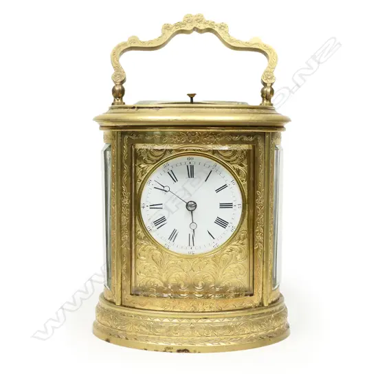 A fine, large 19thC brass oval cased carriage clock with strike and repeat mechanism, signed 'Just' and numbered '71189' to the silvered lever escapement platform,