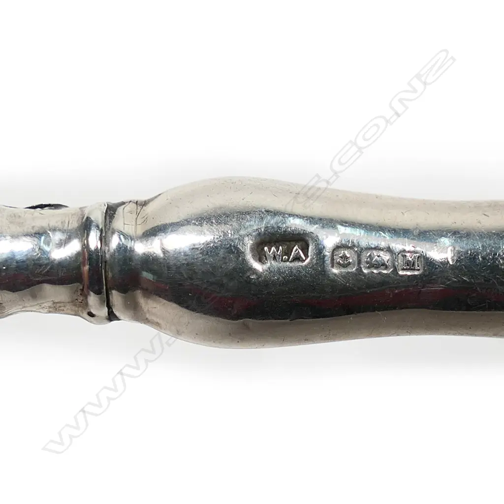 A silver baby rattle, Image 1++